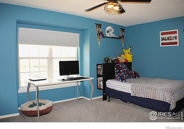 2660 E Otero Pl Unit 7, Centennial, CO 80122 - carpeted bedroom with baseboards and ceiling fan