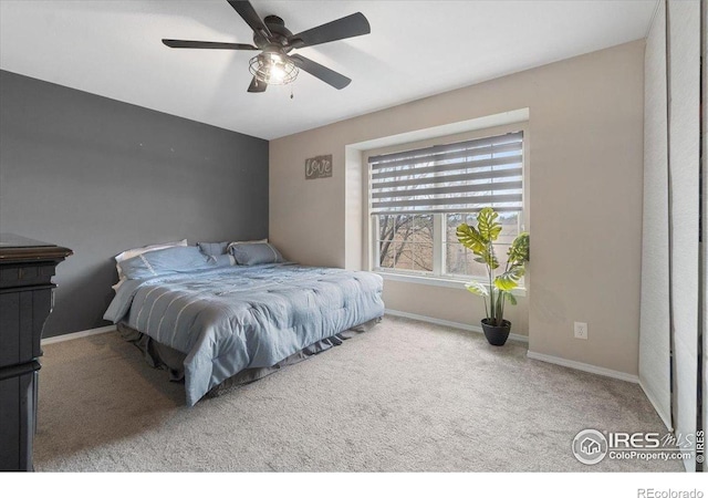 2660 E Otero Pl Unit 7, Centennial, CO 80122 - bedroom featuring carpet floors, baseboards, and ceiling fan
