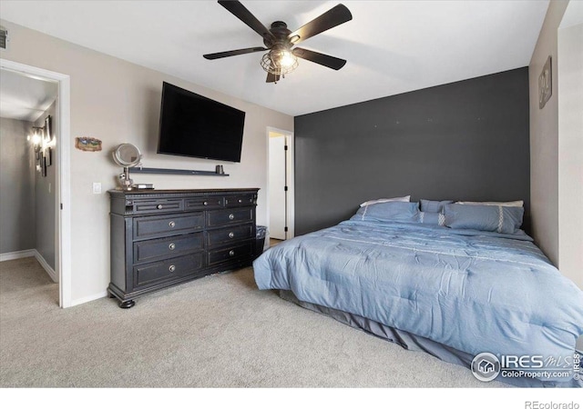 2660 E Otero Pl Unit 7, Centennial, CO 80122 - bedroom featuring carpet floors, baseboards, and a ceiling fan