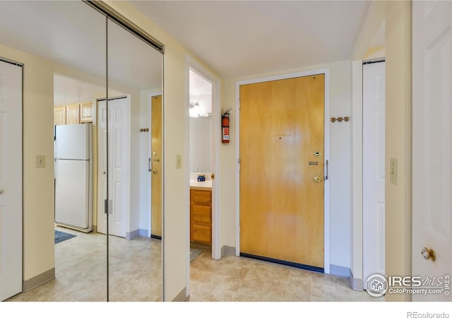 interior space with baseboards