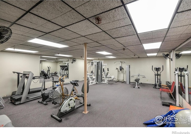 workout area with a drop ceiling