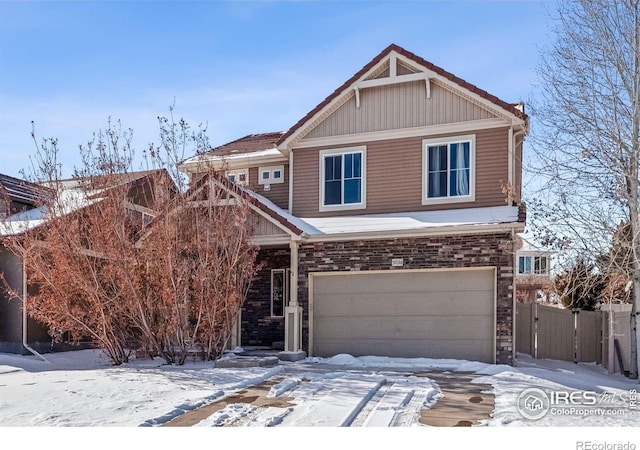 5036 Ridgewood Dr, Johnstown, CO 80534 - view of front of house with fence and a garage