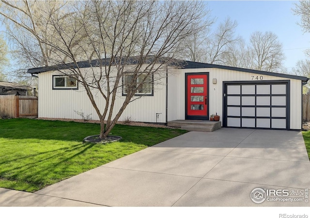 740 32nd St, Boulder, CO 80303 - view of front of home with driveway and an attached garage