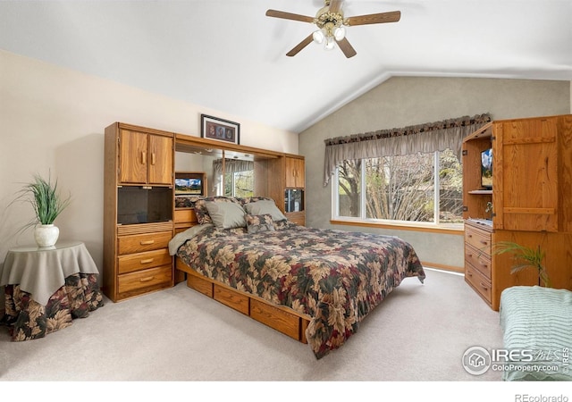 461 Scenic Dr, Loveland, CO 80537 - bedroom with a ceiling fan, vaulted ceiling, and light carpet