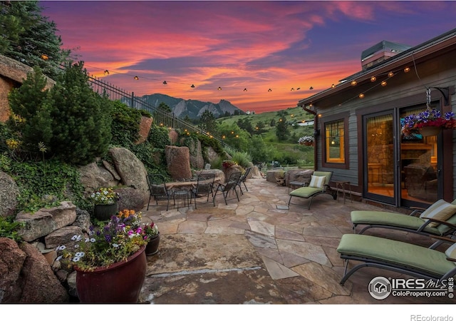 1420 Sierra Dr, Boulder, CO 80302 - view of patio with fence and a mountain view