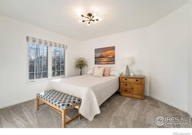 4939 Yoke Ct, Loveland, CO 80537 - bedroom featuring carpet flooring, a chandelier, and baseboards