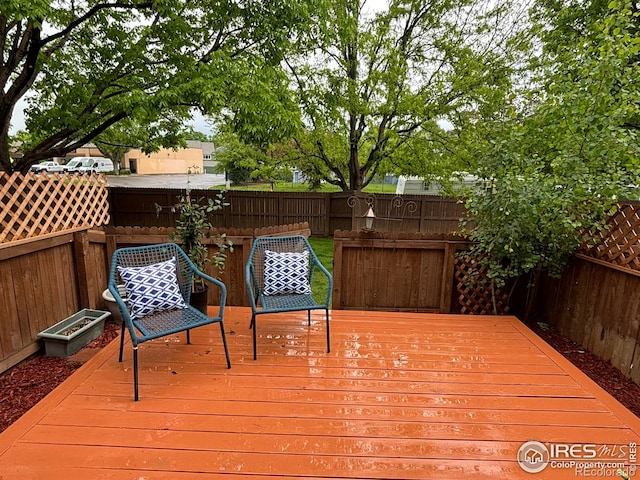 1202 Warrior Way, Lafayette, CO 80026 - wooden deck featuring a fenced backyard