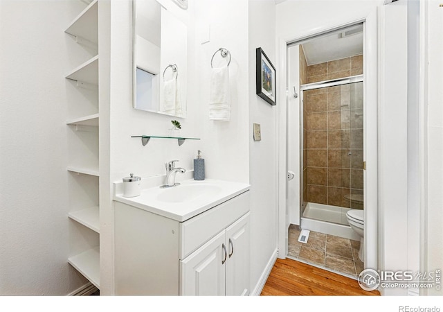 803 Ithaca Dr, Boulder, CO 80305 - full bath featuring a shower stall, toilet, and vanity