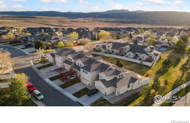 4603 Chokecherry Trl Unit 5, Fort Collins, CO 80526 - aerial perspective of suburban area featuring a mountain backdrop