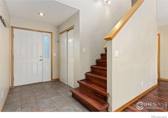 4603 Chokecherry Trl Unit 5, Fort Collins, CO 80526 - entryway featuring stairs and recessed lighting