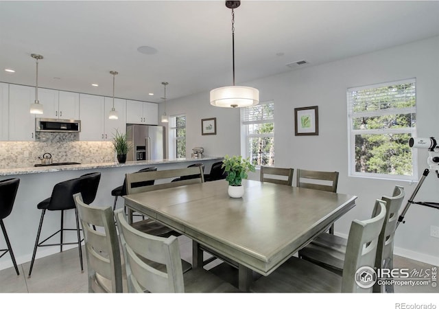 609 Hummer Dr, Nederland, CO 80466 - dining area with recessed lighting, visible vents, and baseboards