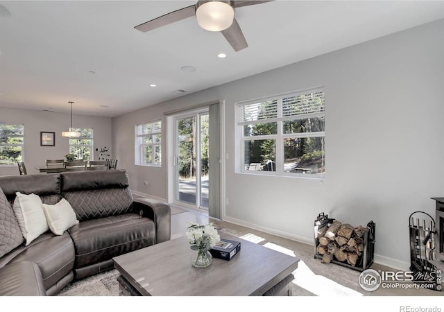 609 Hummer Dr, Nederland, CO 80466 - living room with ceiling fan, recessed lighting, and baseboards