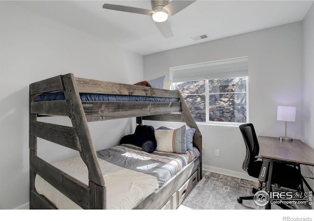 609 Hummer Dr, Nederland, CO 80466 - carpeted bedroom with visible vents, baseboards, and a ceiling fan