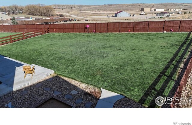 view of yard with a patio