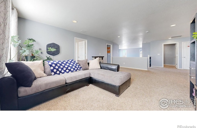 living room with carpet, recessed lighting, and baseboards