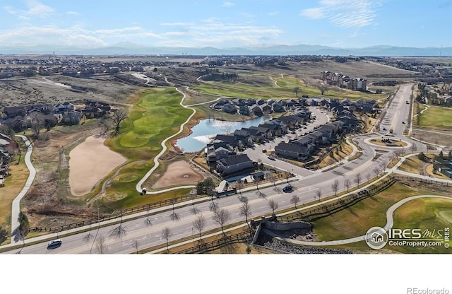 aerial view of a water and mountain view and a golf course