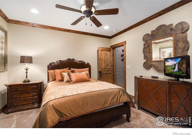 carpeted bedroom with recessed lighting, baseboards, ornamental molding, and a ceiling fan