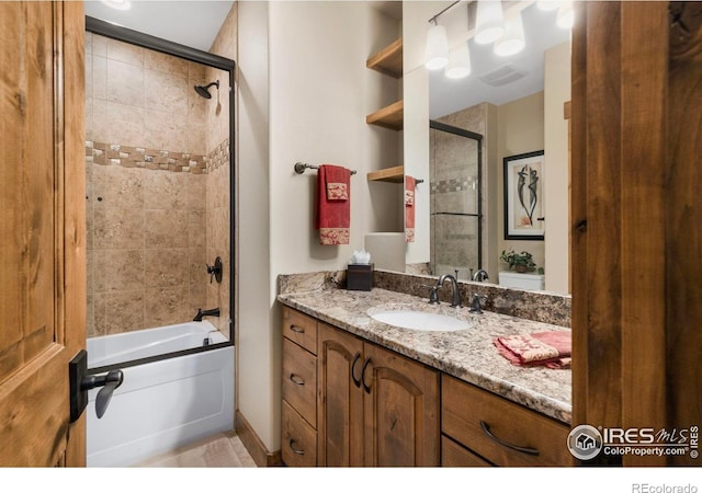 full bath featuring visible vents, shower / bathing tub combination, and vanity