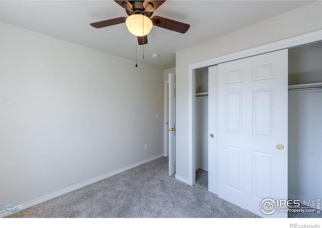 835 Kane Dr Unit 27, Longmont, CO 80501 - unfurnished bedroom with a closet, baseboards, a ceiling fan, and carpet floors