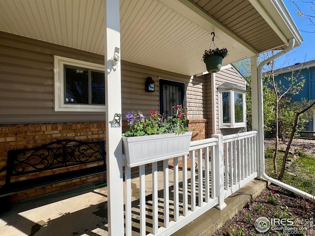 1406 Oak Dr, Berthoud, CO 80513 - entrance to property with a porch