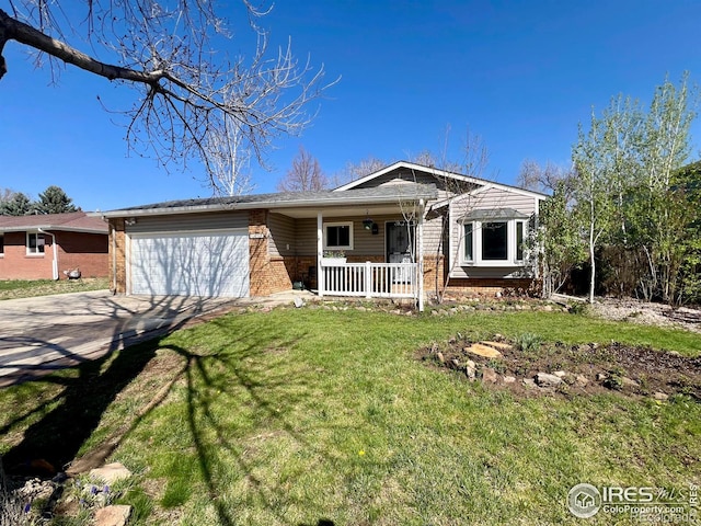 1406 Oak Dr, Berthoud, CO 80513 - ranch-style house featuring an attached garage, covered porch, concrete driveway, brick siding, and a front lawn