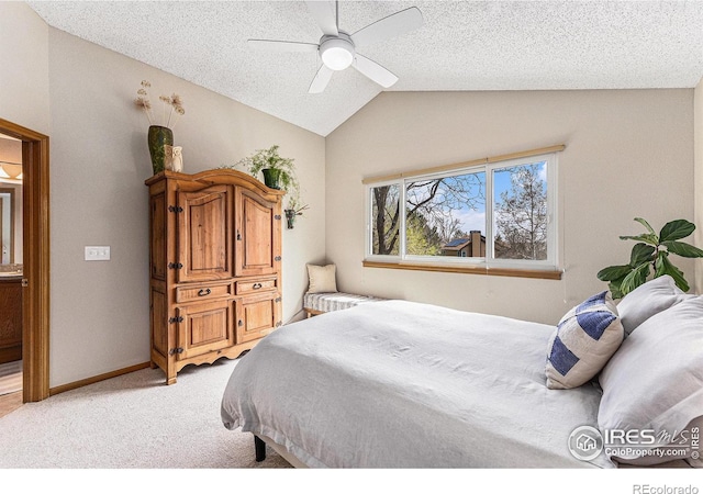 bedroom featuring baseboards, ceiling fan, a textured ceiling, light carpet, and lofted ceiling