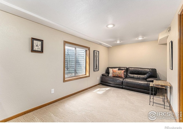living room featuring recessed lighting, carpet flooring, and baseboards