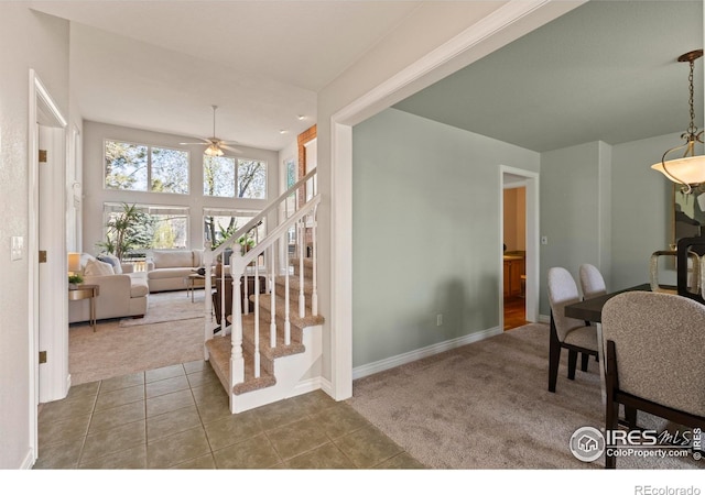 4748 Westbury Dr, Fort Collins, CO 80526 - tiled dining area featuring stairs, carpet flooring, baseboards, and ceiling fan
