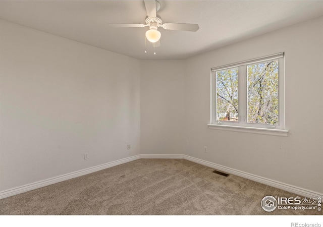 4748 Westbury Dr, Fort Collins, CO 80526 - spare room with visible vents, baseboards, ceiling fan, and carpet