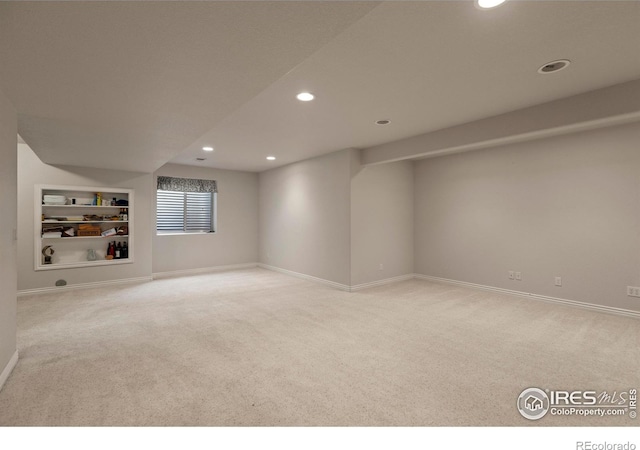 4748 Westbury Dr, Fort Collins, CO 80526 - basement with recessed lighting, built in shelves, baseboards, and carpet floors