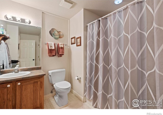 4748 Westbury Dr, Fort Collins, CO 80526 - full bath featuring a shower with shower curtain, vanity, visible vents, and toilet