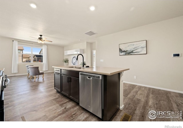 243 Gwyneth Lake Dr, Severance, CO 80550 - kitchen with stainless steel dishwasher, a ceiling fan, a sink, and visible vents