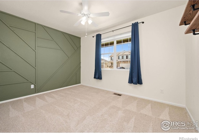 243 Gwyneth Lake Dr, Severance, CO 80550 - empty room featuring baseboards, a ceiling fan, visible vents, and carpet