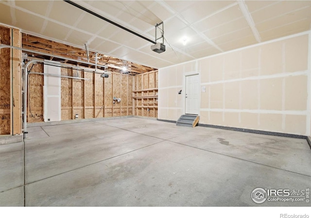 243 Gwyneth Lake Dr, Severance, CO 80550 - garage featuring a garage door opener