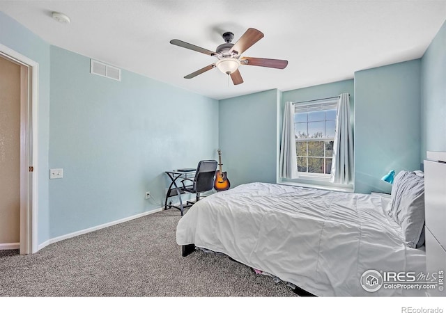 bedroom featuring carpet flooring, baseboards, a ceiling fan, and visible vents