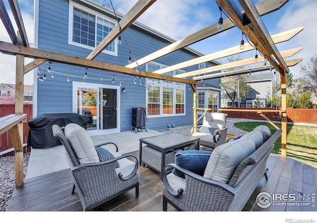 deck featuring outdoor lounge area, a pergola, and fence