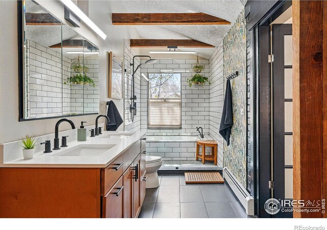 full bath with tile patterned floors, a baseboard radiator, a sink, and toilet