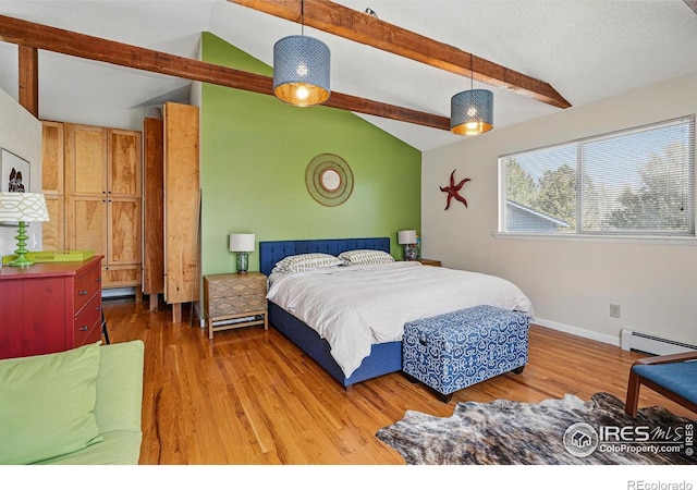 bedroom featuring a baseboard radiator, light wood-type flooring, a baseboard heating unit, and lofted ceiling with beams