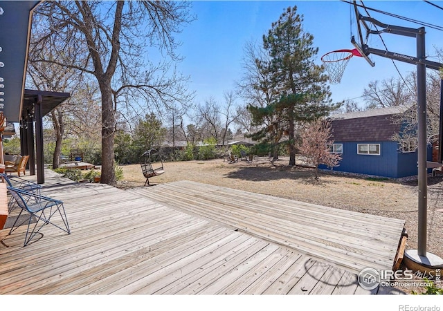 deck with an outbuilding