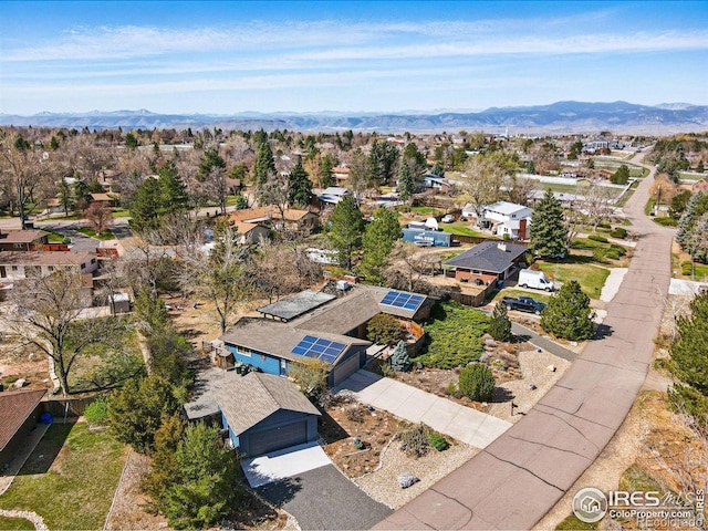bird's eye view featuring a residential view and a mountain view