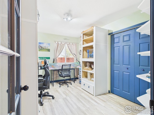 office space with wood finished floors