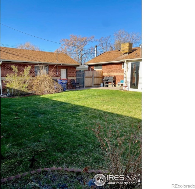 7170 Zuni St, Denver, CO 80221 - view of yard featuring a patio area and fence
