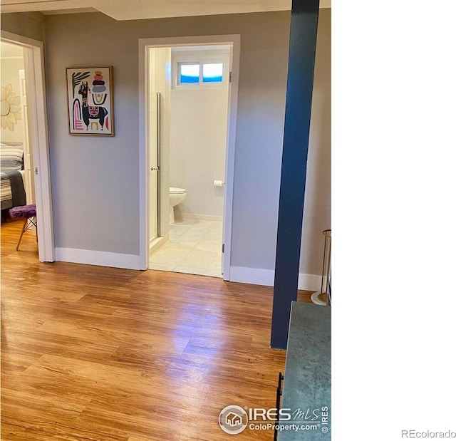 7170 Zuni St, Denver, CO 80221 - interior space with light wood-style flooring and baseboards