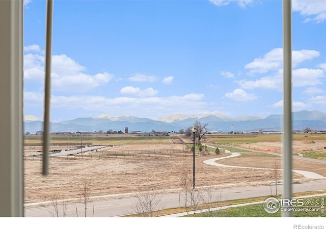 property view of mountains featuring a rural view