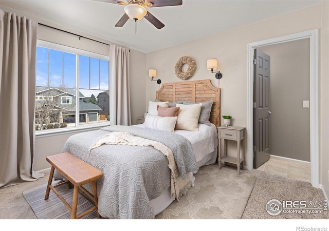 248 Muscovey Ln, Johnstown, CO 80534 - bedroom featuring light tile patterned flooring and ceiling fan