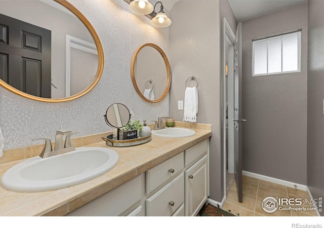 248 Muscovey Ln, Johnstown, CO 80534 - full bathroom with a sink, tile patterned floors, and double vanity