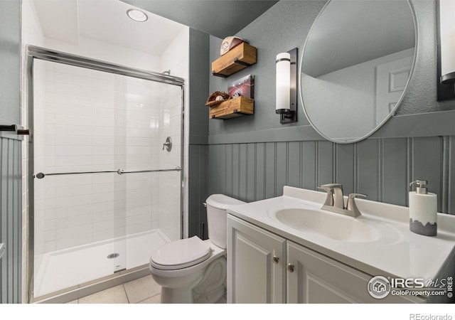 248 Muscovey Ln, Johnstown, CO 80534 - bathroom with a decorative wall, toilet, and a shower stall