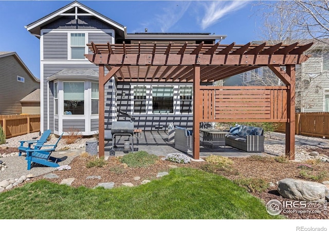 248 Muscovey Ln, Johnstown, CO 80534 - back of house featuring a patio, a pergola, fence, and an outdoor hangout area