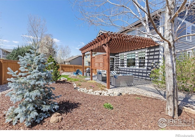 248 Muscovey Ln, Johnstown, CO 80534 - view of yard with a fenced backyard, outdoor lounge area, a patio, and a pergola