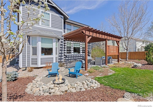 248 Muscovey Ln, Johnstown, CO 80534 - rear view of property with a pergola, a patio area, an outdoor living space with a fire pit, fence, and central air condition unit